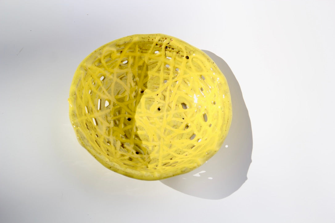 Handmade yellow woven bowl
