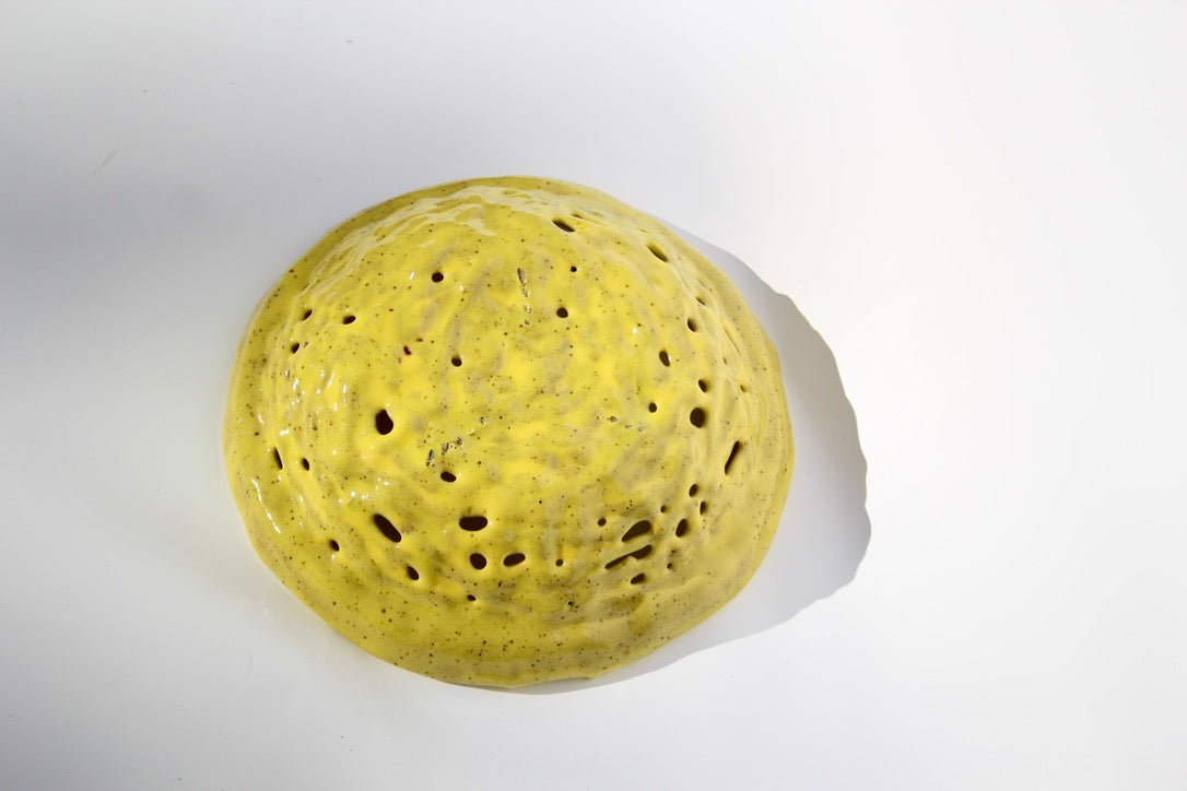 Handmade yellow woven bowl