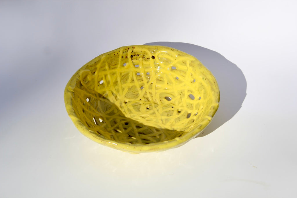 Handmade yellow woven bowl