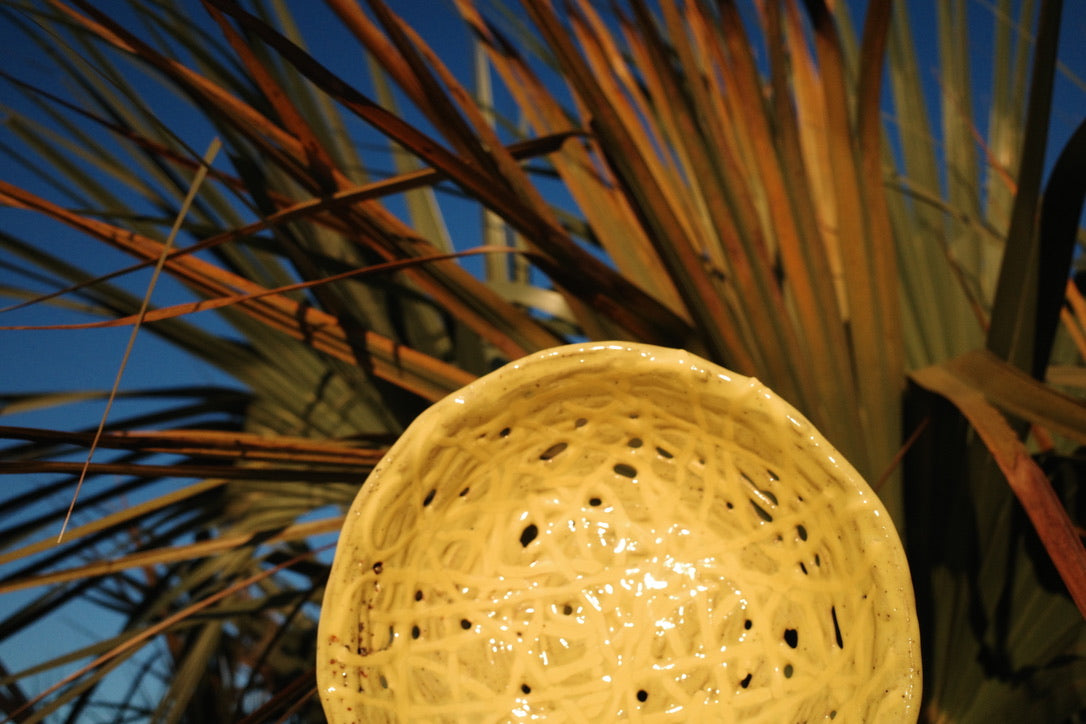 Handmade yellow woven bowl